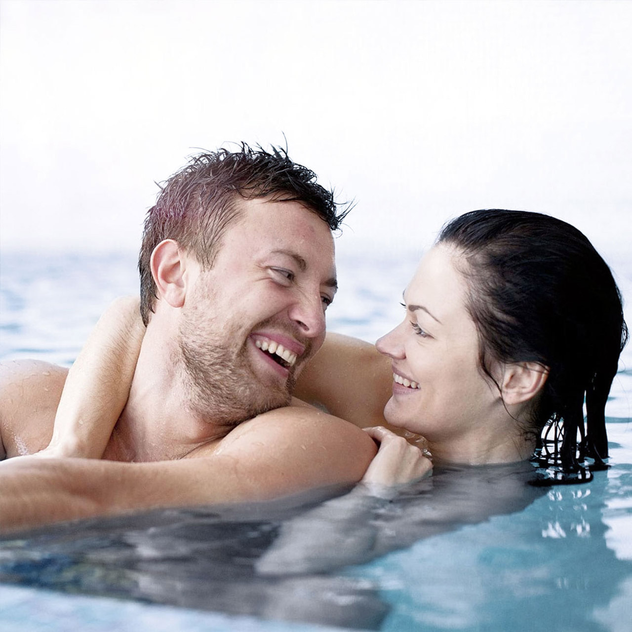 Couple in swimming pool
