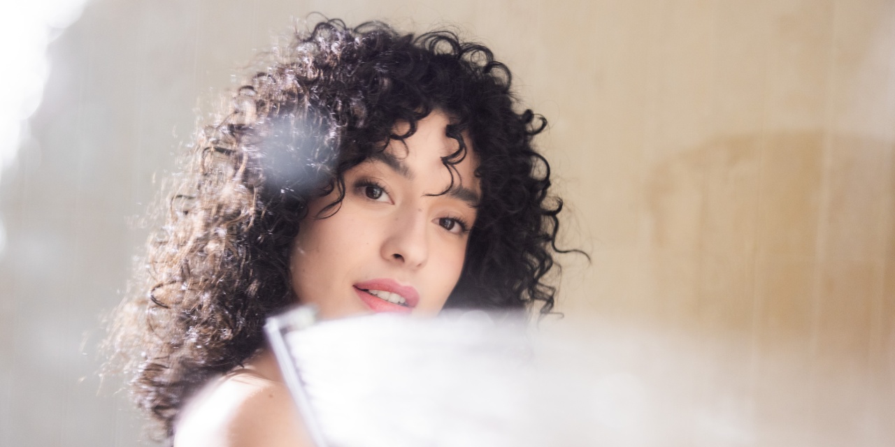 Woman with shower head