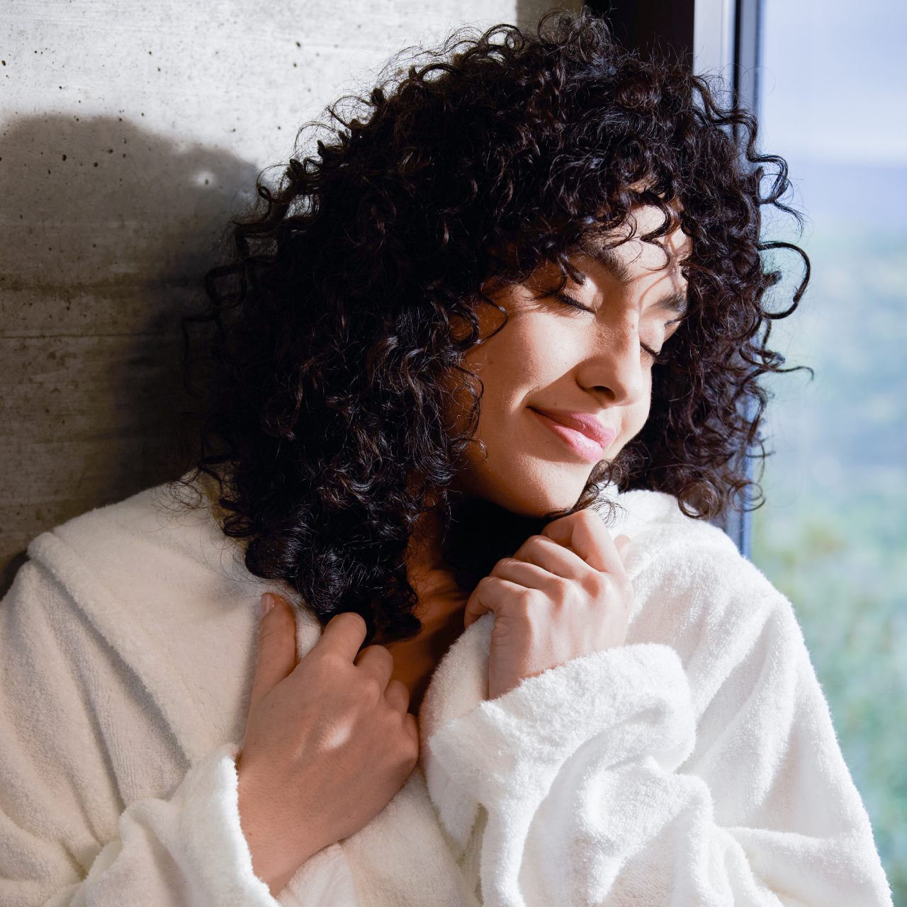A woman in a bathrobe