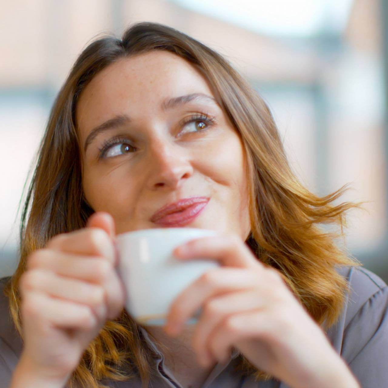 Woman enjoy her hot drink