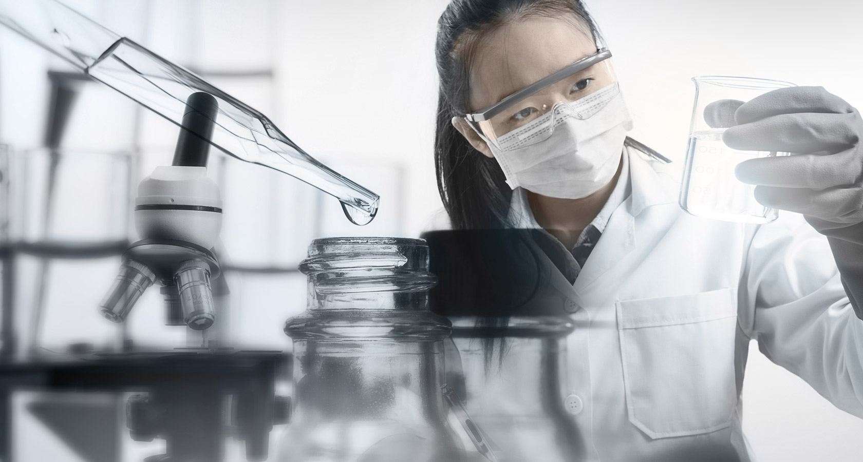 Female chemist analysing water