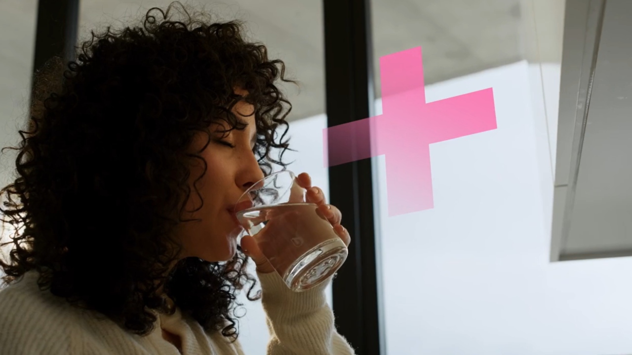 Woman drinks water