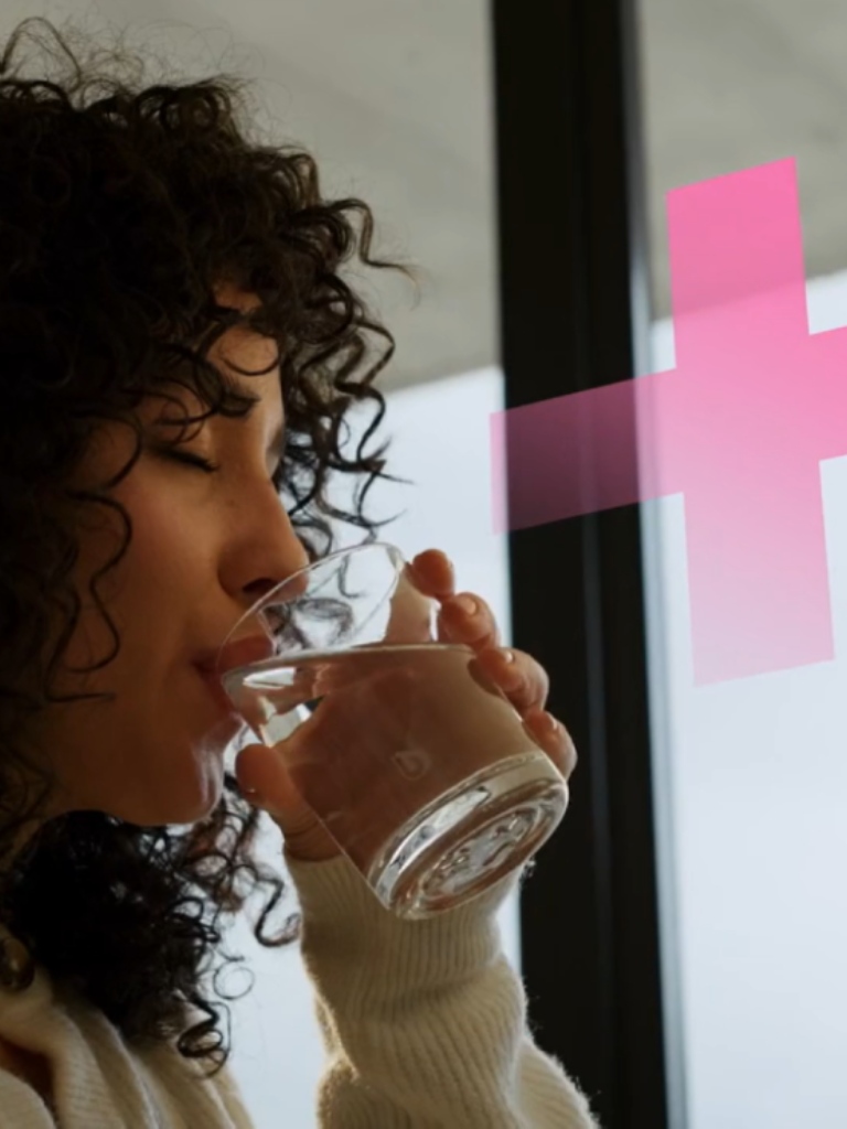 Woman drinks water