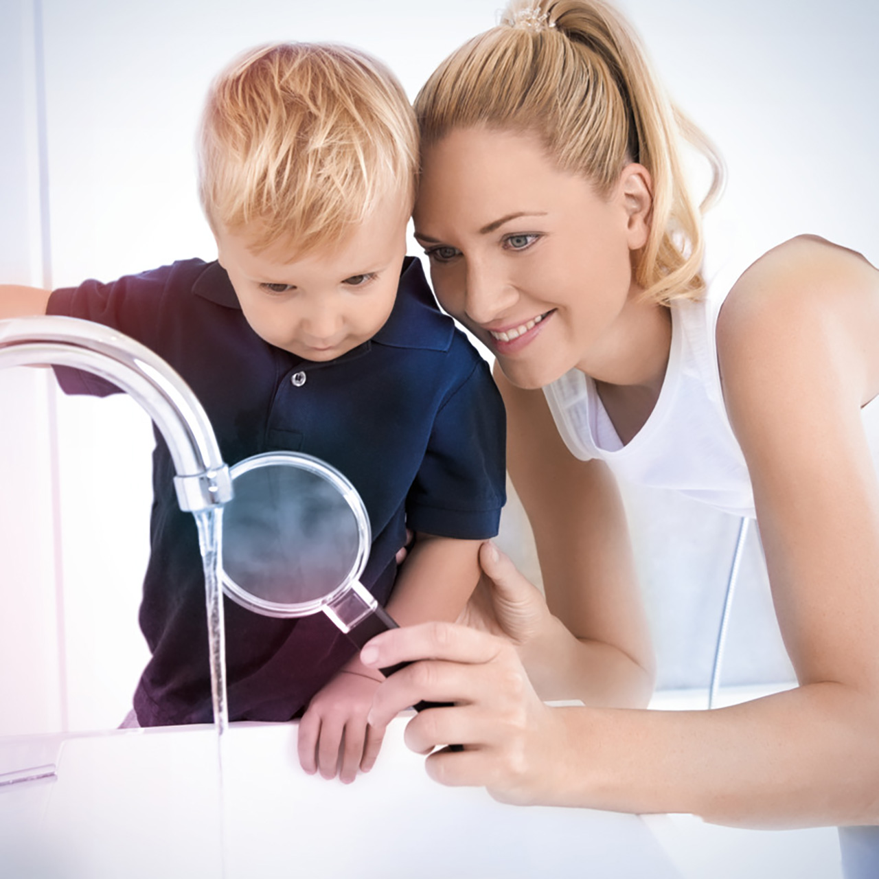 Woman with child looking at water