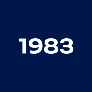 The white number 1983 stands in the center of a dark blue background.