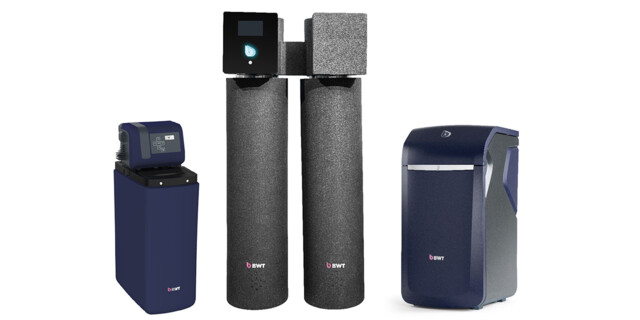 A selection of modern water softener units from BWT, featuring sleek, dark-toned designs. 